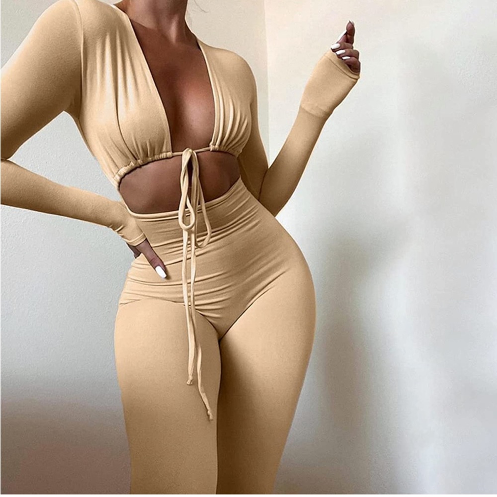 nude cut out jumpsuit